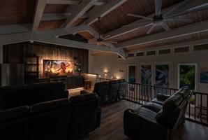 Settle into plush recliners for a cozy movie night in your private theater.