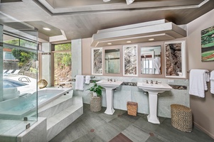 Primary ensuite with dual sinks and soaking tub