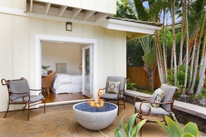 Downstairs primary bedroom lanai with fire pit