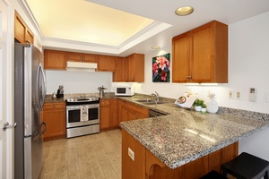 Spacious kitchen with ample counter space, great for preparing home-cooked meals.