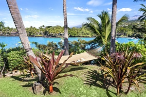 Sway gently in your private hammock, surrounded by tropical gardens and stunning ocean views in this island paradise.