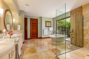 Pamper yourself in the en suite bath featuring an outdoor shower garden and elegant indoor finishes.