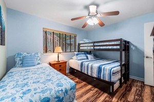 Guest Bedroom three with a twin and a bunk bed at ground level, the perfect room for the little ones.