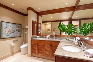 Dual vanity bathroom for bedroom 4 with expansive counter space and mirror—form meets function in every detail.