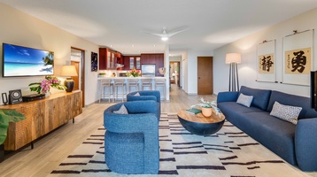 Enjoy seamless flow from kitchen to living room in this open-concept design ideal for entertaining and unwinding together.