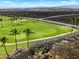 Panoramic views of Mauna Lani's championship golf course just steps away.