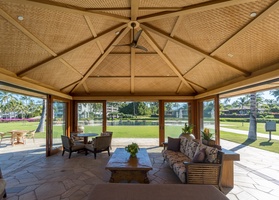 Relax or dine in the open-air community hale, designed for gathering in comfort.