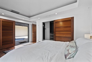 Soft textures, natural light, and plantation shutters create a calming retreat in every bedroom.