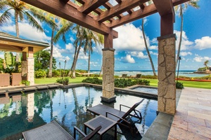 Spend the day lounging beside the oceanfront pool and jacuzzi, surrounded by swaying palms and Pacific views.