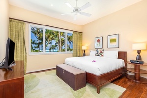 The primary suite features a king-size bed and a walk-in closet