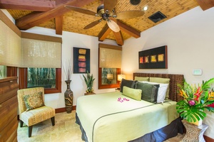 Chic downstairs east guest room with island charm and modern comfort.
