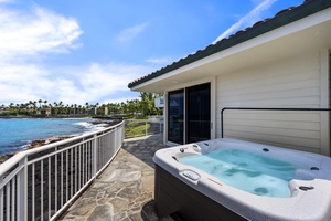 Hot tub located right outside of the downstairs bedroom