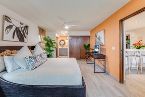 Spacious and calming, the primary suite features a king bed, dual closets, and private bath for restful relaxation.
