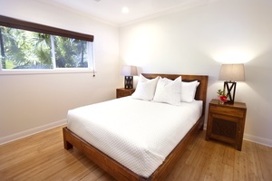 Bright and airy guest suite with a queen bed for a restful night
