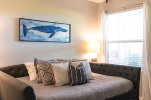 Guestroom offers a queen bed with a full sized trundle bed underneath