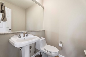 A convenient guest powder room. near the living room.