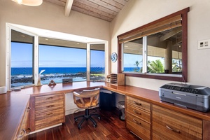 Dedicated workspace in the primary suite with lanai access—perfect for remote working with a view.