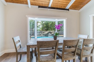 Dining area has a large farmhouse-style table