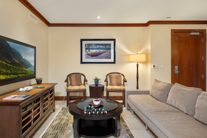 Sink into the plush seating in the living area after a fun day at the beach