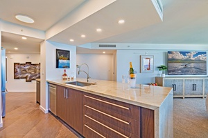 Kaanapali Shores 702’s modern kitchen island is perfect for cooking or island cocktails.