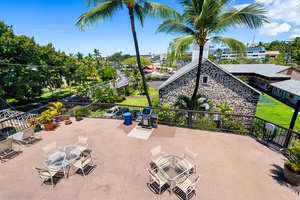 Surrounded by swaying palms and tropical views, perfect for your morning coffee or evening barbecue gathering.