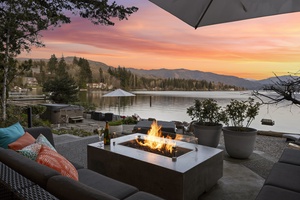 Share stories and stargaze beside the modern firepit as the sky turns shades of lavender—your ultimate lakeside gathering spot.