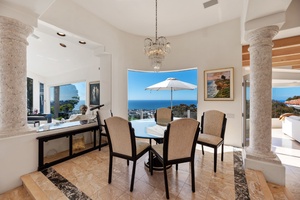 Step up Dining Room adjacent to the Formal Living Room bringing elegance together