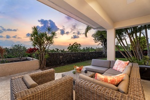 Sunset views from the outdoor lounge area with plush seating, ideal for unwinding.