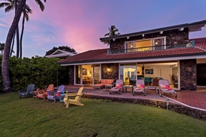 The home glows at dusk, inviting you to unwind as evening settles in.