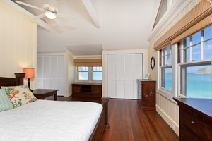 Third guest bedroom with a king bed and panoramic ocean views.