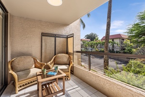 Cozy patio seating area for relaxing with a book or morning coffee.