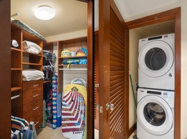 Store your belongings easily in your spacious walk-in closet with custom shelving and convenient in-unit laundry.
