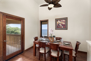 Cozy dining area with seating for six, perfect for family meals or gatherings.