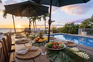 Dine poolside as golden sunset paints the sky, with tropical palms swaying and fresh fruits awaiting your evening feast.