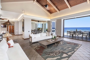 Vaulted ceilings with large sliding doors make this room spectacular