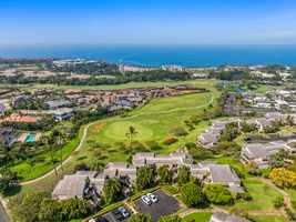 Aerial view of Wailea Ekolu Resort, featuring the resort buildings and scenic golf course.
