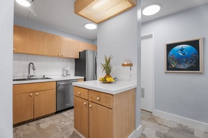 Compact kitchen island for meal preparation