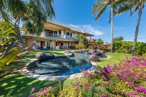 Free-form Pool and Lush Landscaping Provide a Peaceful Retreat to Spend the Day