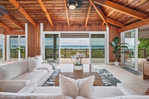 Relax on the plush couch and soak in panoramic views of Lanikai Beach and the Mokulua Islands.