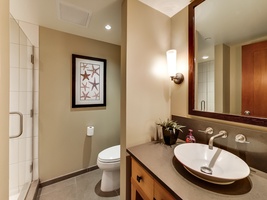 The third guest bathroom has a walk-in shower.