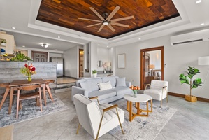 Contemporary seating area flowing into the dining space for easy entertaining.