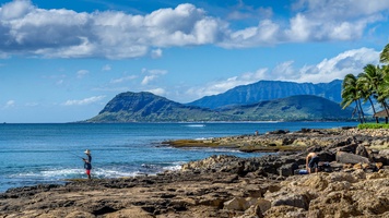 Picturesque skies over sand weathered rock formations.