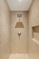 A separate shower for the primary ensuite bath.