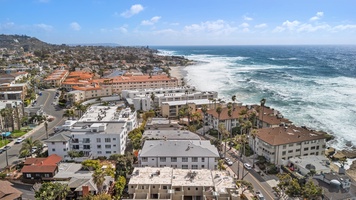 Stunning aerial view of La Jolla’s coastline, where the ocean meets the shore.