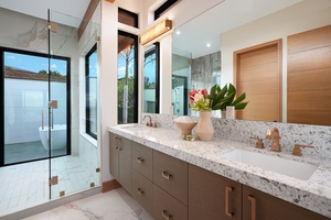 Refresh in this bright ensuite, where sleek design meets natural light, creating an airy sanctuary for both beginning and unwinding the day.