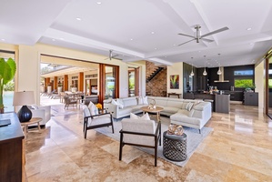 Spacious living area with an open design that blends indoor and outdoor spaces.