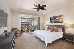 Downstairs primary bedroom featuring a king size bed and a private lanai.