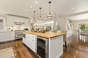 Beautiful kitchen overlooks the living and dining areas