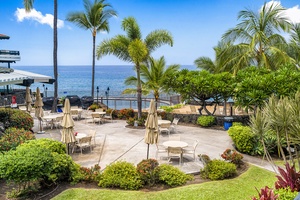 Relax with a book or sip a cool drink while taking in the ocean breeze from this scenic lounge area.