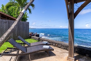 Bask in the warm Hawaiian sun or watch for dolphins from your private shoreline seating.